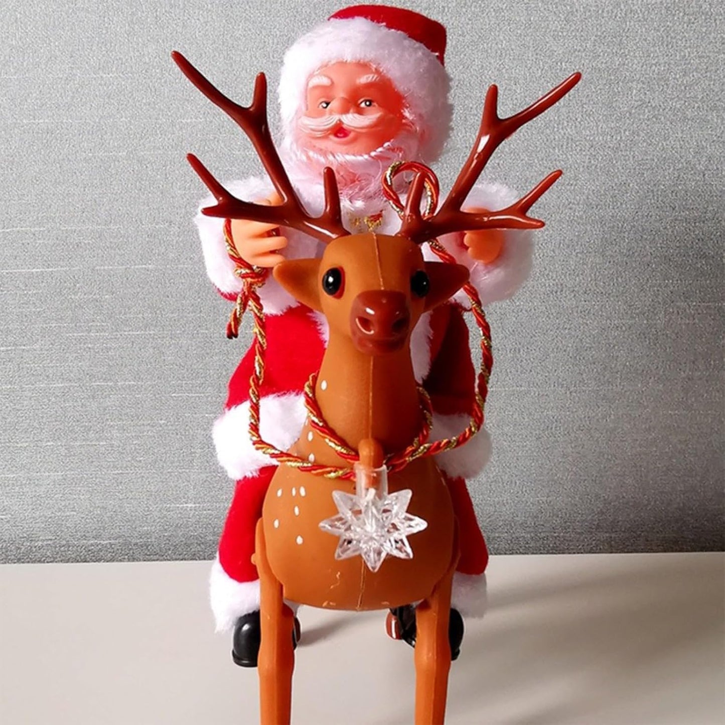 Budget Store UK Riding Santa Claus with Deer - Electric Moving Figure Musical Christmas Toy