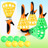 Pop-and-catch ball game set with 4 catch launchers and 8 balls. The catch launchers are yellow and green with handles, and the balls are green and yellow.