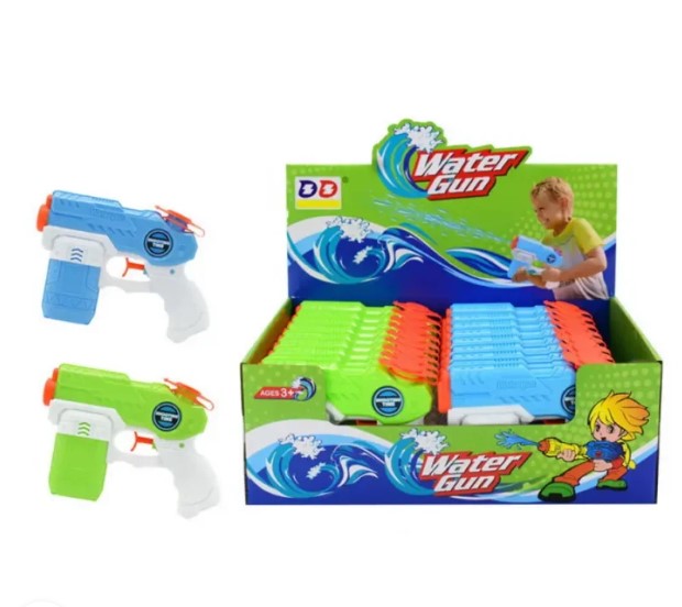 Kids playing with water guns at beach